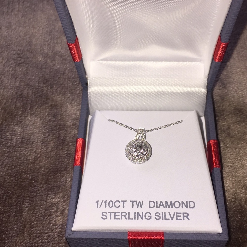 1/10CT TW Diamond Sterling Silver Necklace.